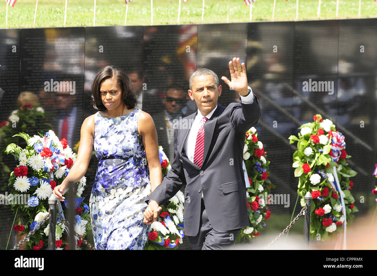 US President Barack Obama and first lady Michelle Obama arrive for Memorial Day ceremonies marking the 50th anniversary of the Vietnam War at the Vietnam Memorial Wall May 28, 2012 in Washington, DC Stock Photo