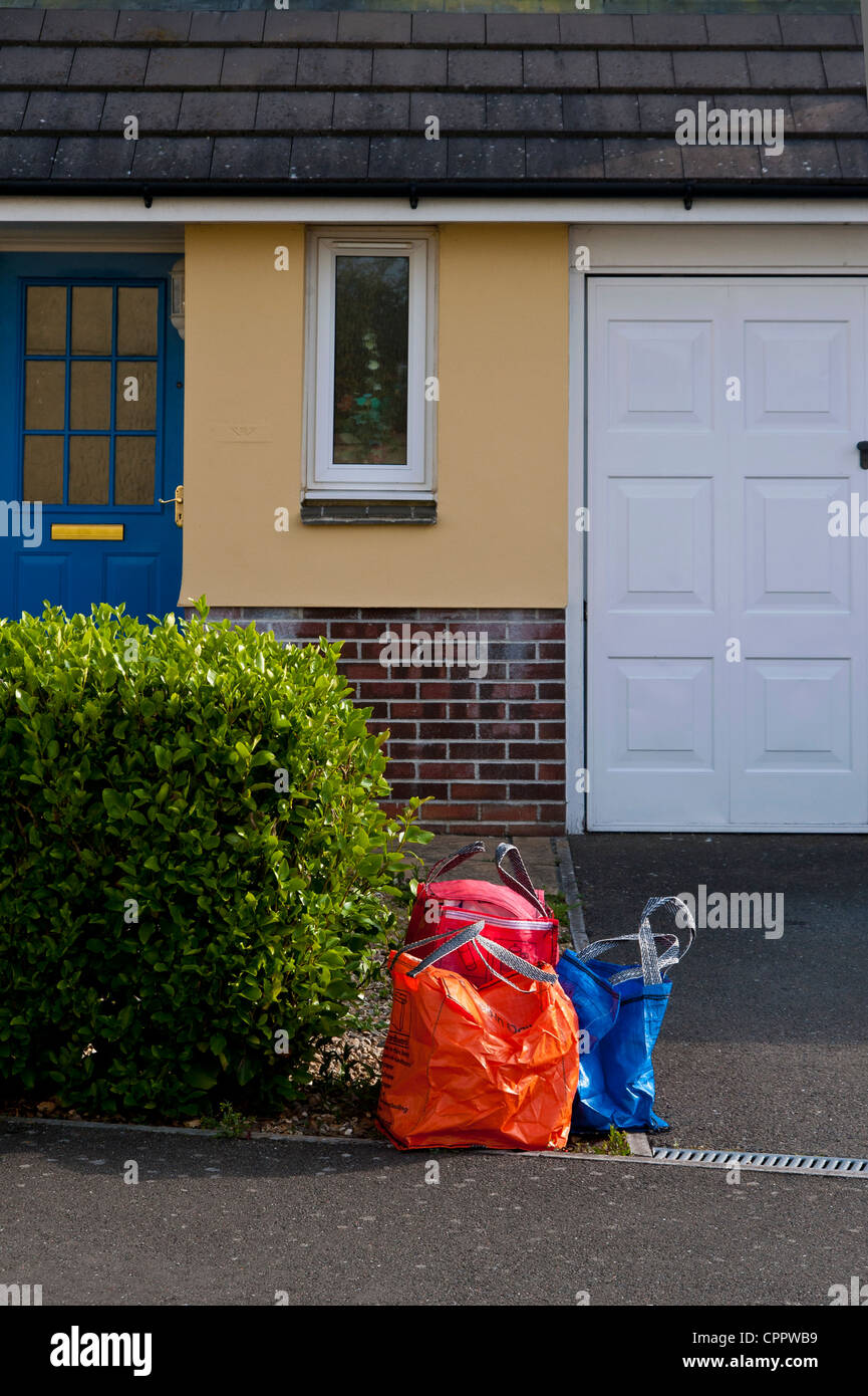 Household waste and recycling awaiting kerbside collection by Cornwall