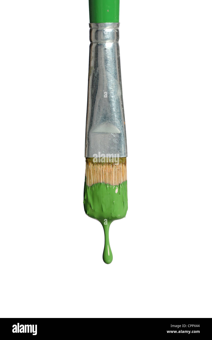 Paintbrush with green paint isolated over white background Stock Photo
