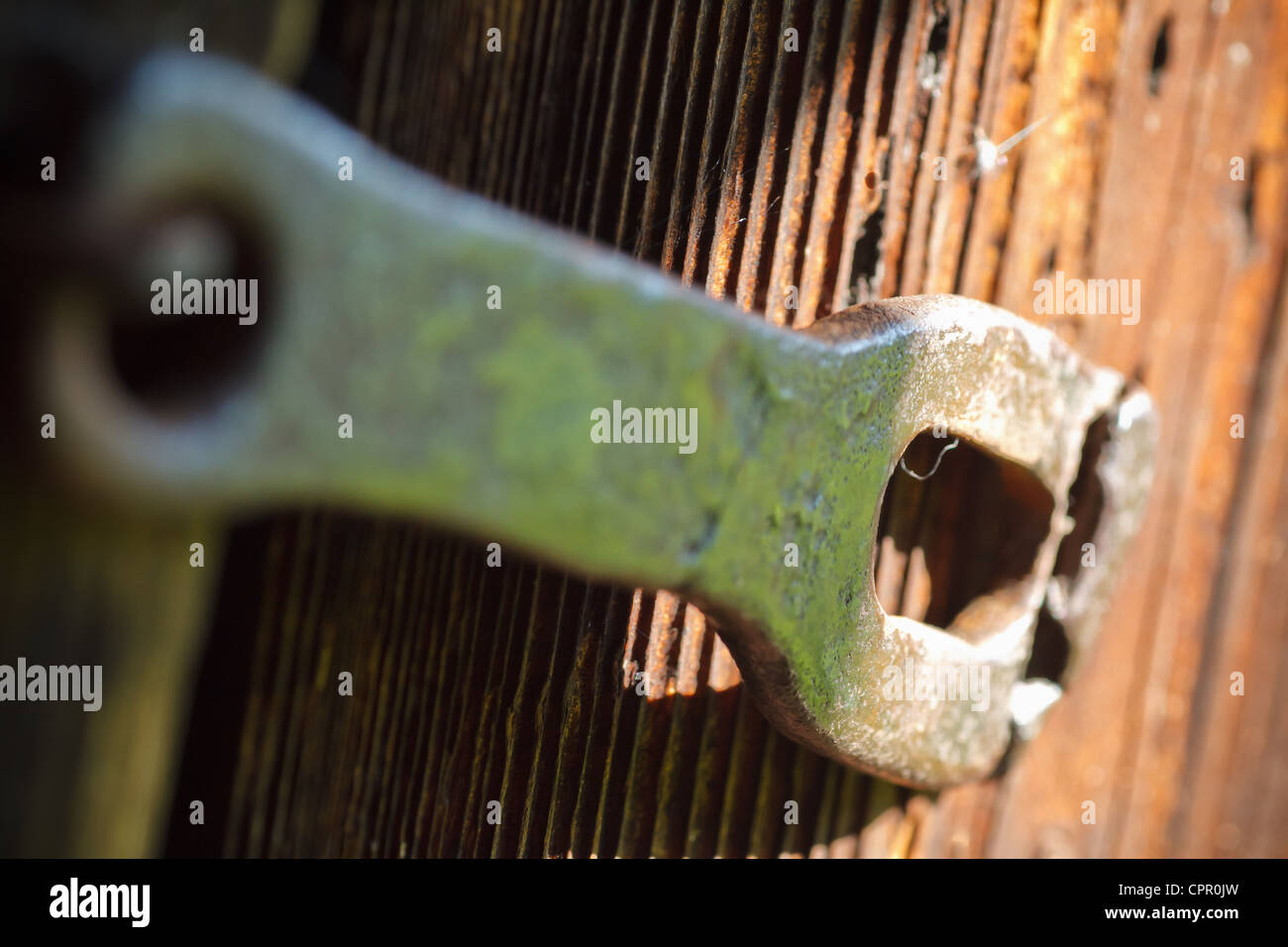Old rusty staple on a wooden shed. Stock Photo