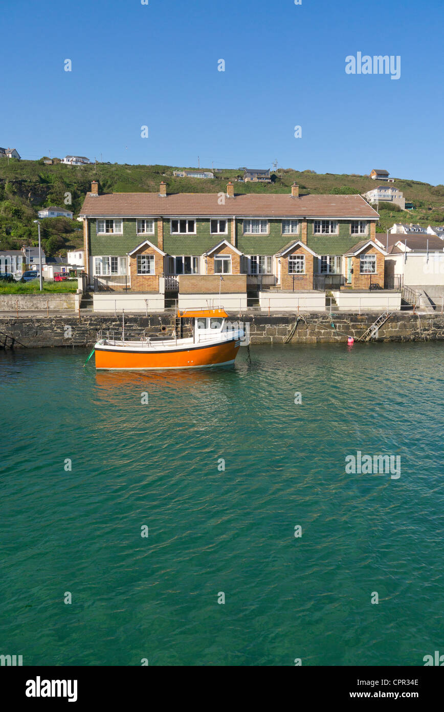 Portreath harbour and harbourside houses near high tide.  Cornwall UK. Stock Photo
