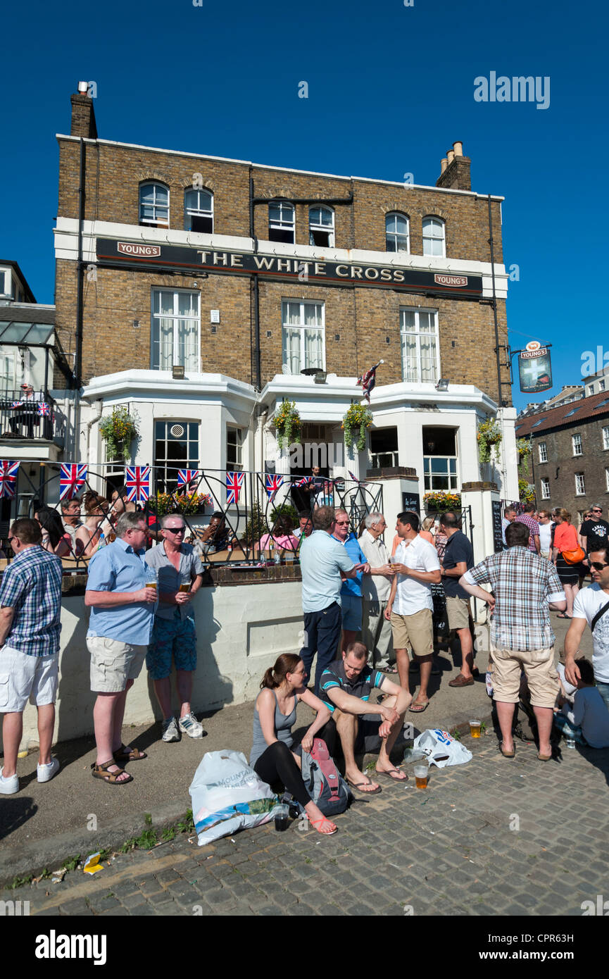 The White Cross pub Richmond on Thames London UK on a summer day with people relaxing outside in the sunshine Stock Photo