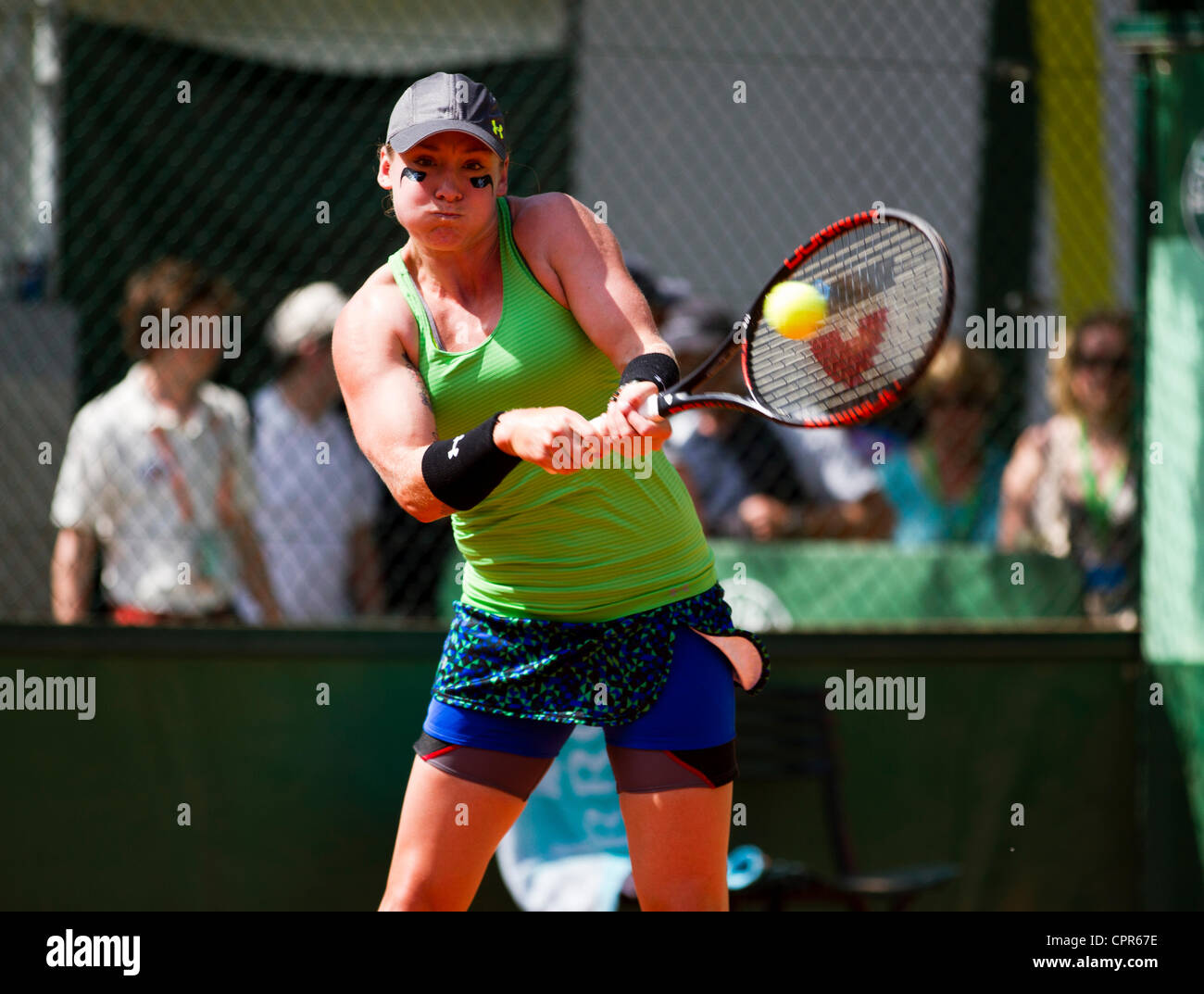 30.05.2012 Paris, France. Bethanie Mattek-Sands in action against Sloane Stephens on day 4 of the French Open Tennis from Roland Garros. Stock Photo