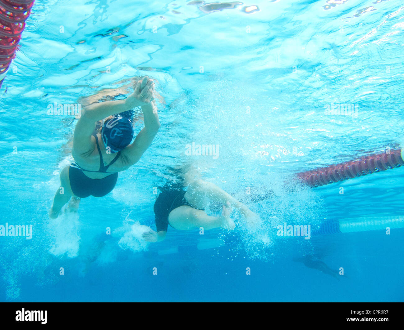 Mature woman swimming pool inside hi-res stock photography and images ...
