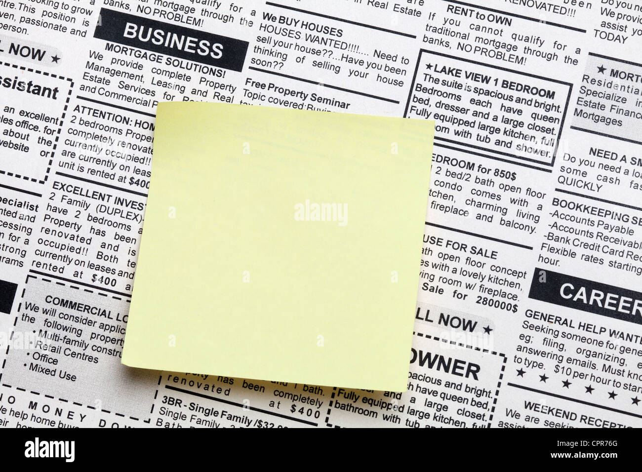 Fake Classified Ad, newspaper and sticky note Stock Photo Alamy