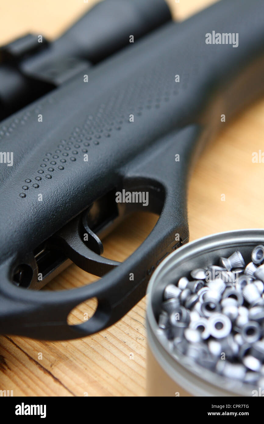 part of an air rifle and pellets Stock Photo Alamy