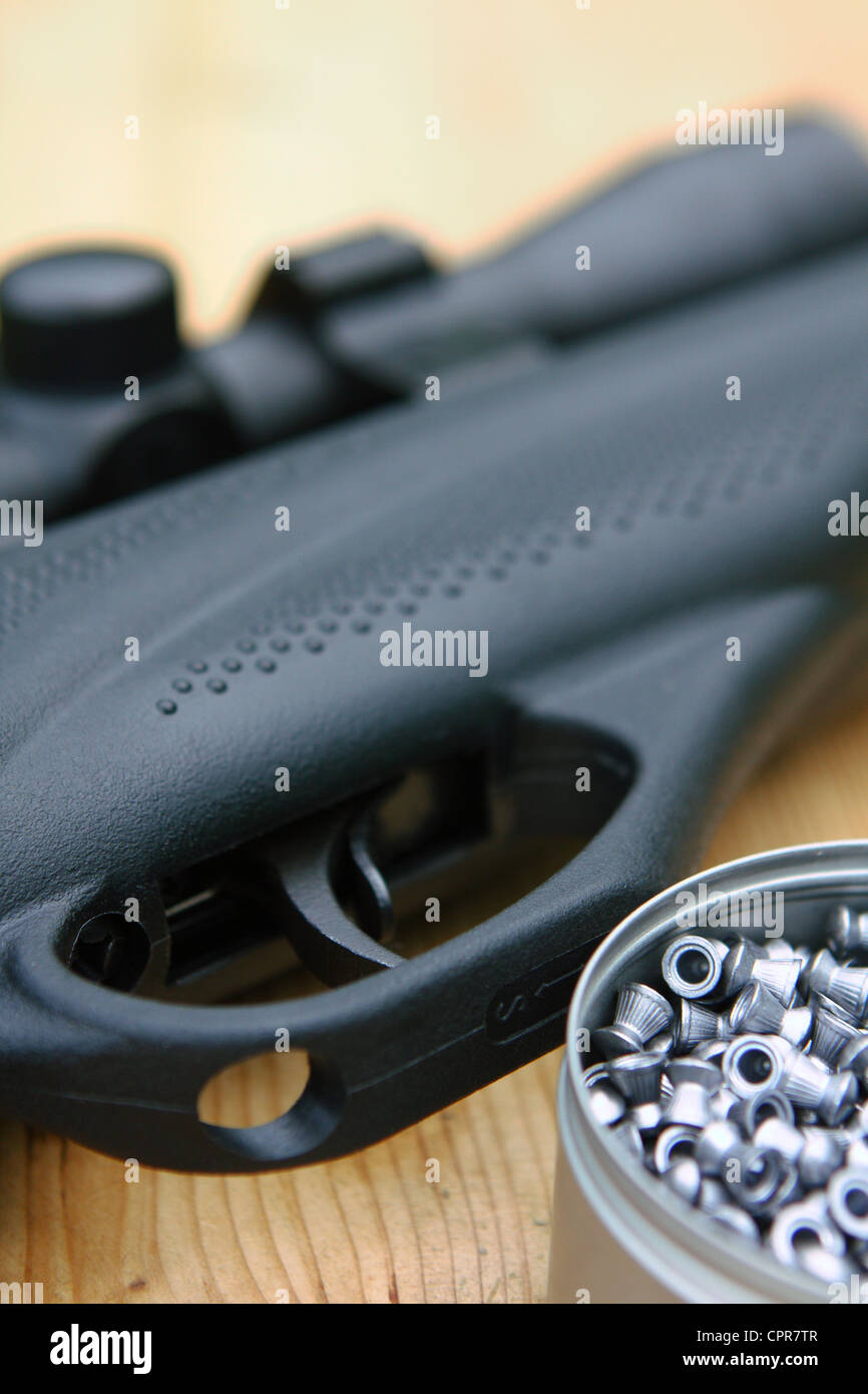 part of an air rifle and pellets Stock Photo Alamy