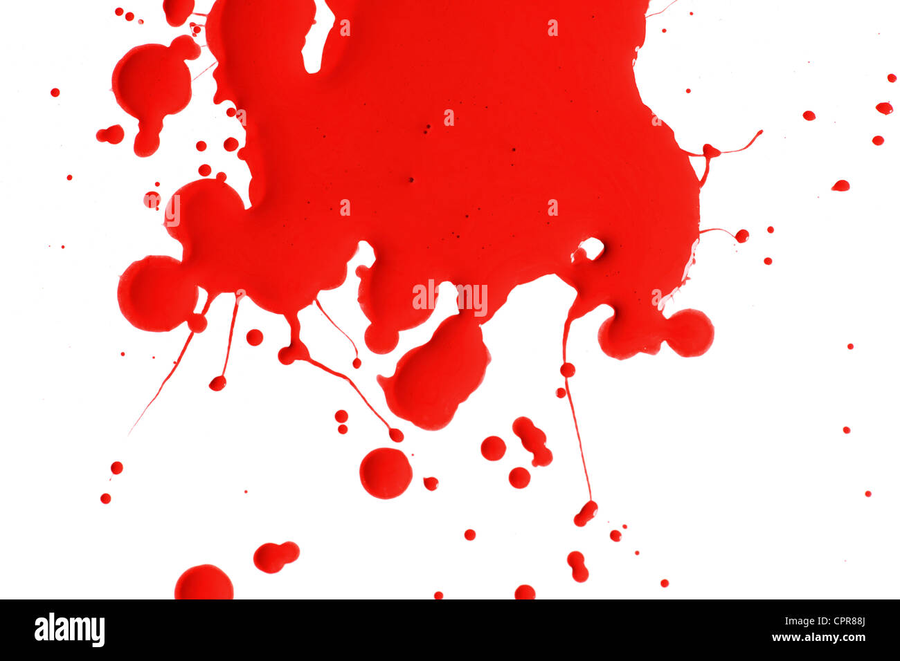 Splash of red paint isolated over white background Stock Photo