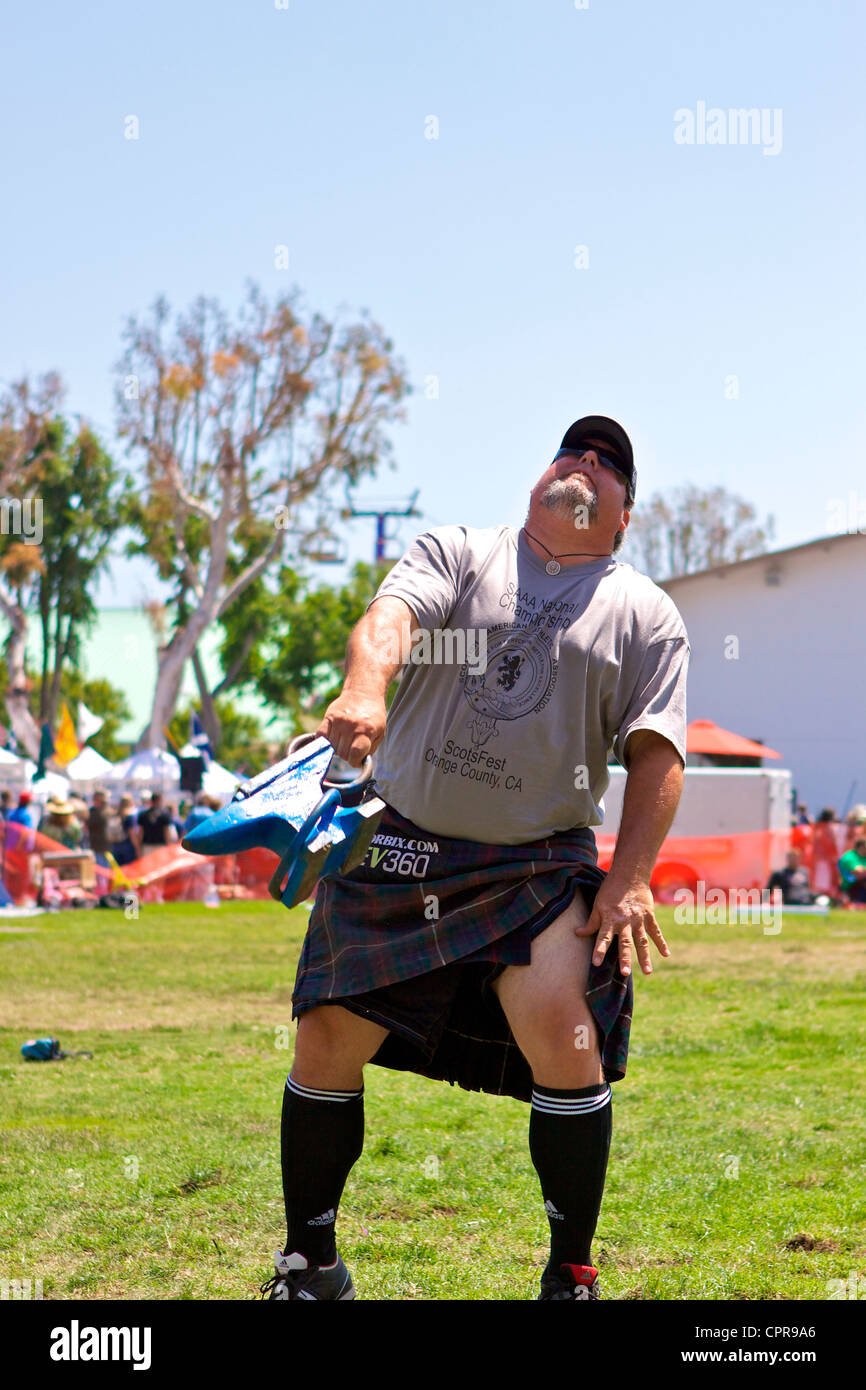 Athletes in kilts throwing the anvil at the American Scottish Festival