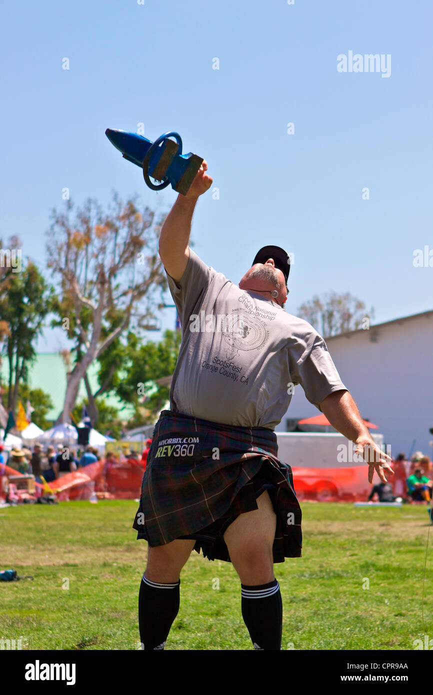 Athletes in kilts throwing the anvil at the American Scottish Festival