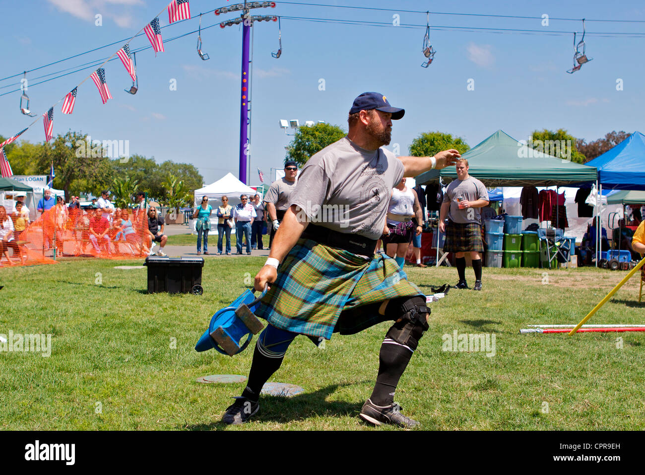 Athletes in kilts throwing the anvil at the American Scottish Festival Costa Mesa California USA