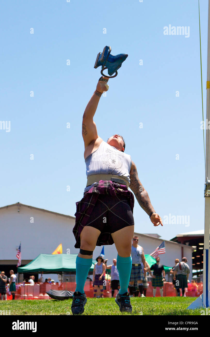 Athletes in kilts throwing the anvil at the American Scottish Festival