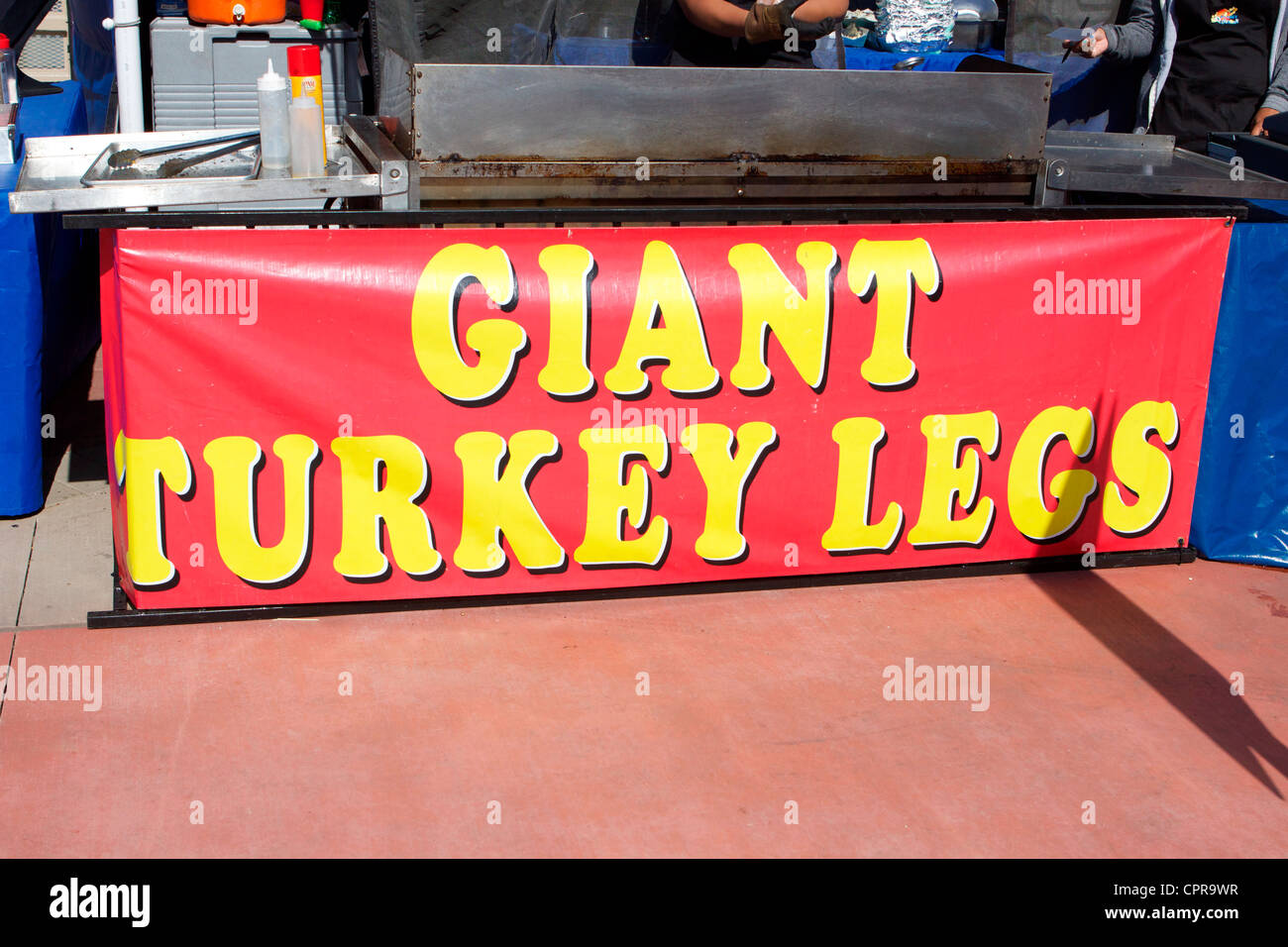 Giant cooked turkey legs for sale at at the Scottish Festival Orange County Fairgrounds Costa Mesa, California. Stock Photo