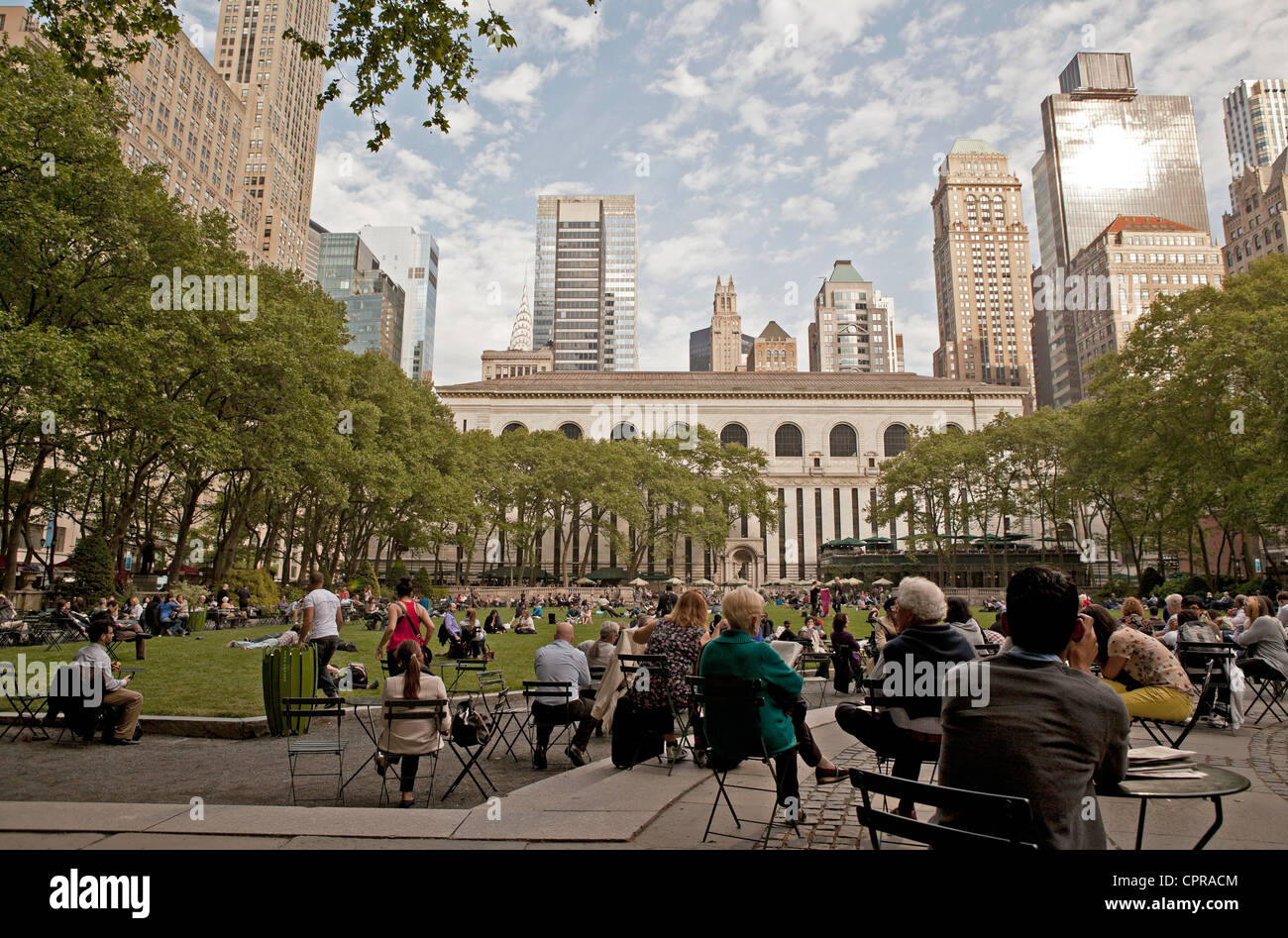People hang out admiring the views in Bryant Park in New York City Stock  Photo - Alamy