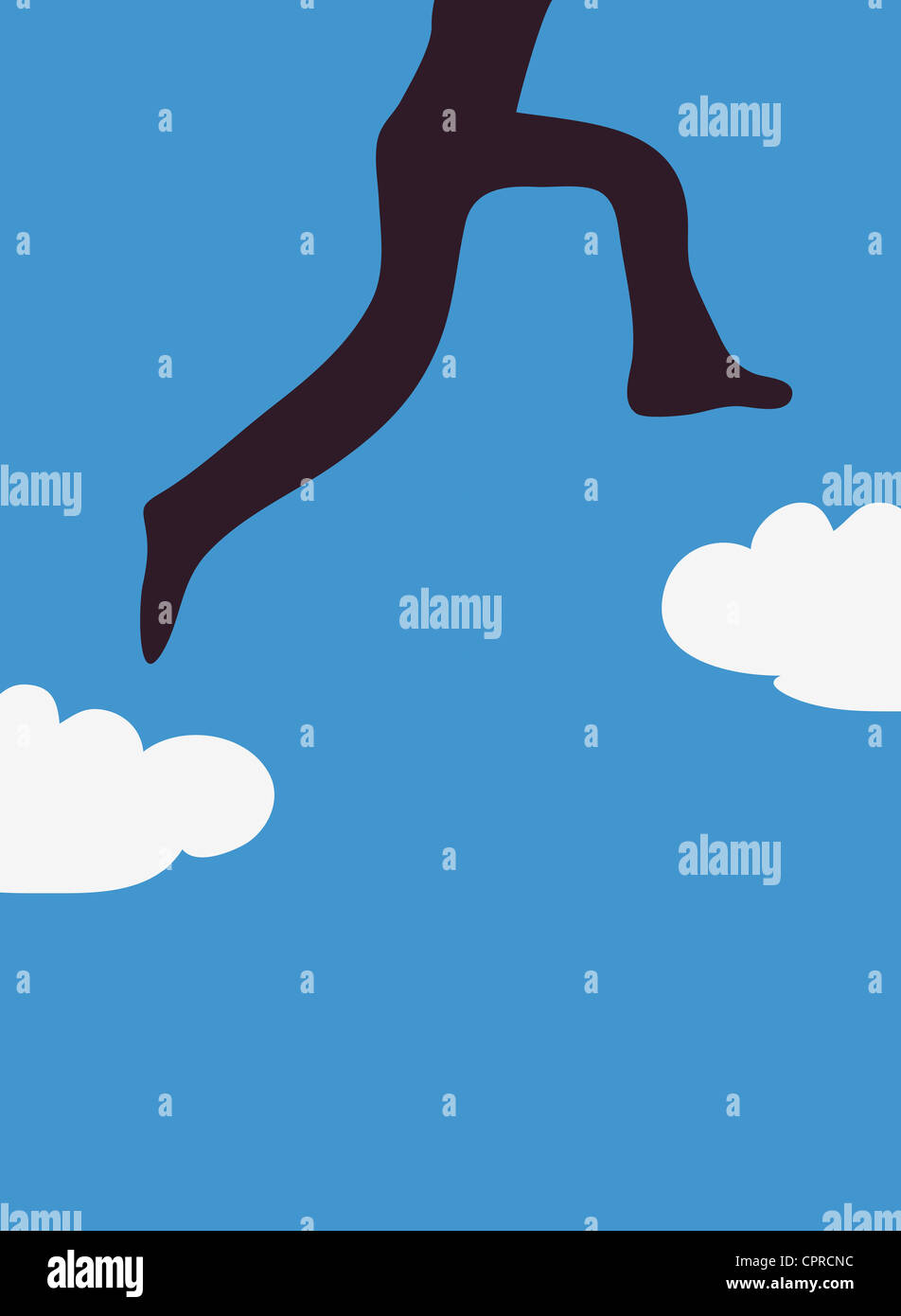 One successful person jumping between white clouds on a blue sky. Stock Photo