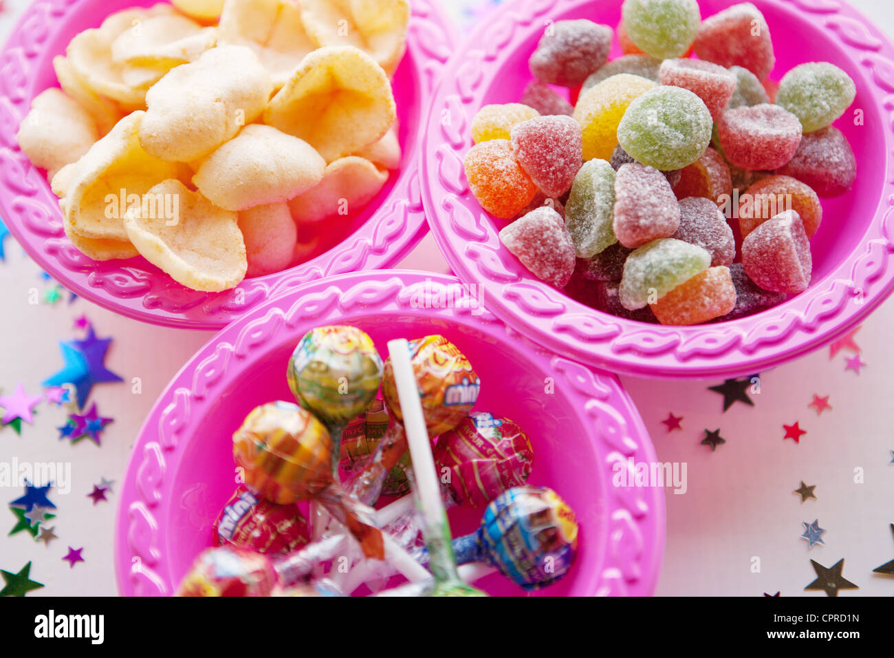 Party food in pink plastic bowls Stock Photo Alamy