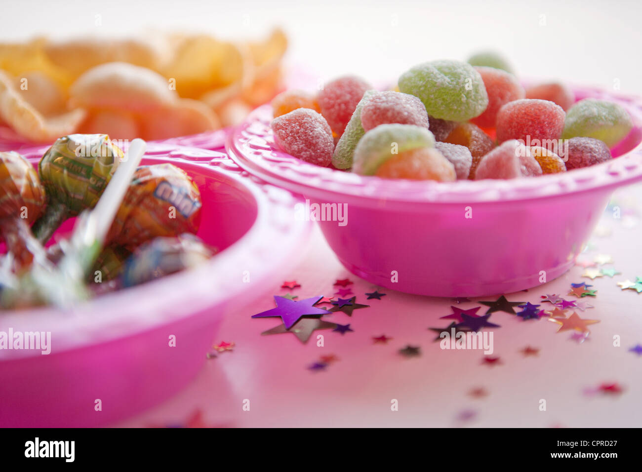 Party food in pink plastic bowls Stock Photo Alamy