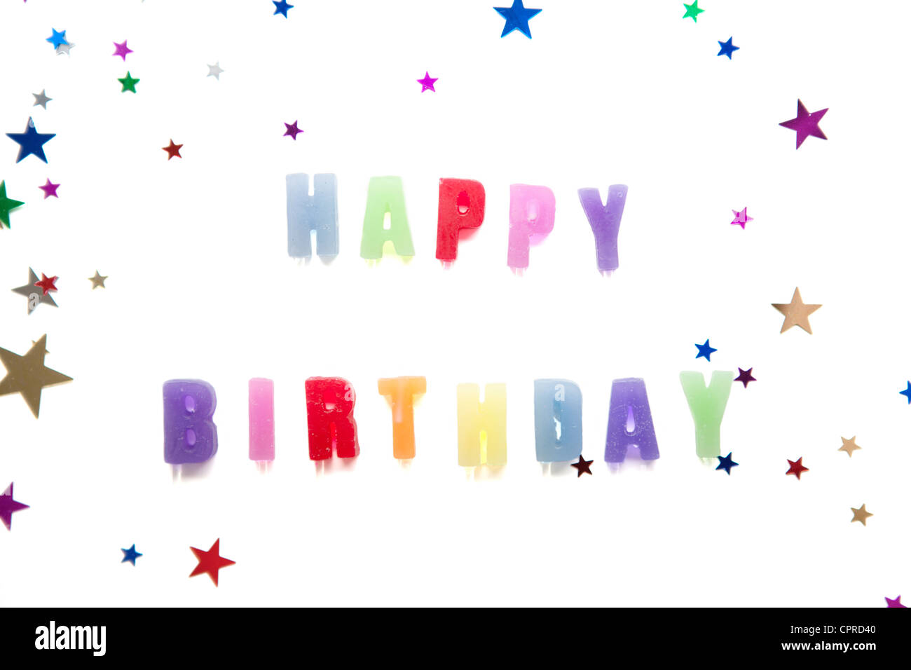 the words happy birthday using candles set on a white background