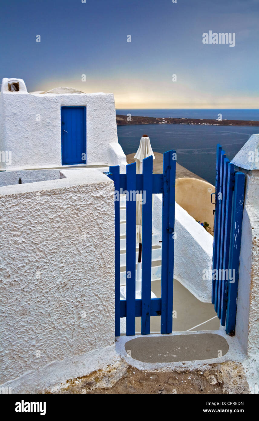 Wikkit Gate wicket gate and build in typical Santorini colors Stock Photo - Alamy