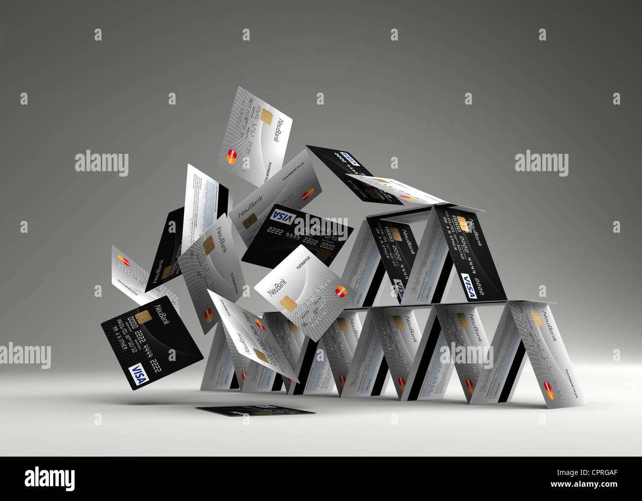 Photorealistic 3d render of a house of credit cards collapsing Stock Photo