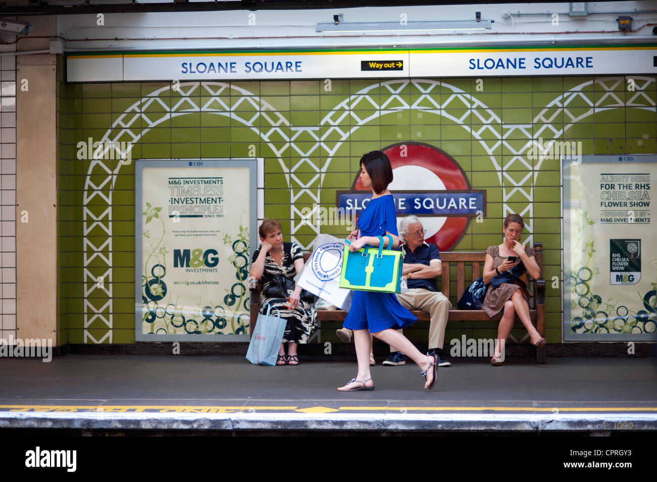 London, England, UK. Sloane Square Underground Station with people waiting for tube train. May 2012. Stock Photo