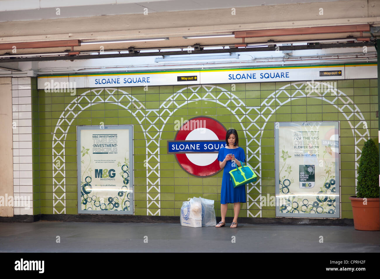 London, England, UK. Sloane Square Underground Station with people waiting for tube train. May 2012. Stock Photo