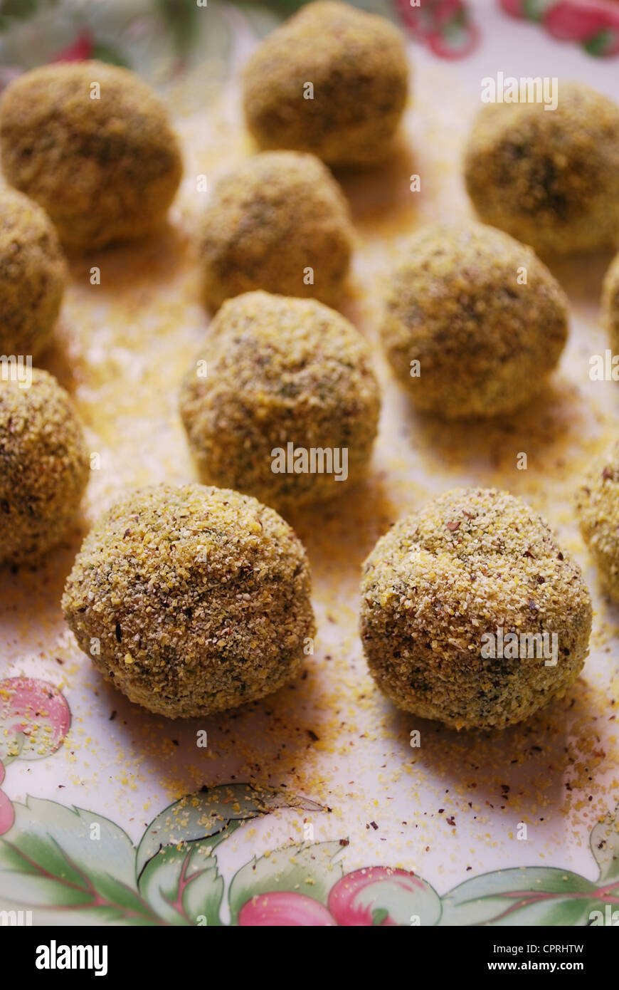 Vegetarian meatballs with cereals, seeds and spinach ready to be fried Stock Photo Alamy