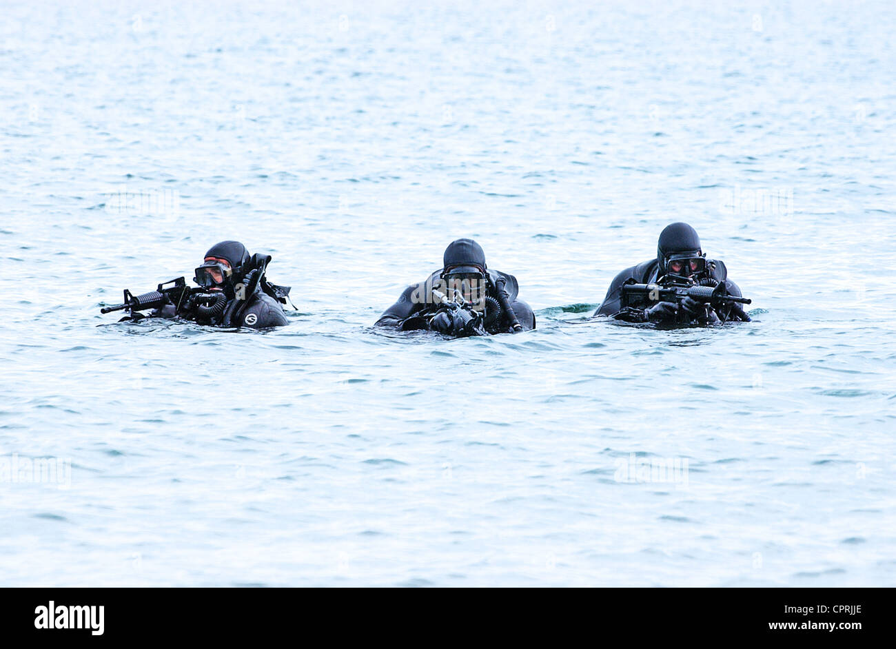 US Navy SEALs practice beach landings during combat training Stock Photo Alamy