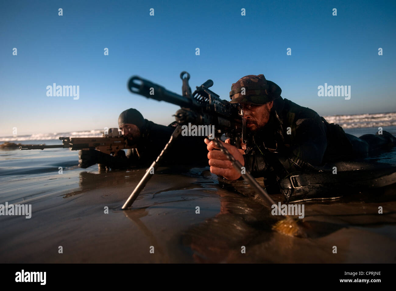 US Navy SEALs during water training at sunrise October 21, 2009 in Coronado, CA. Stock Photo