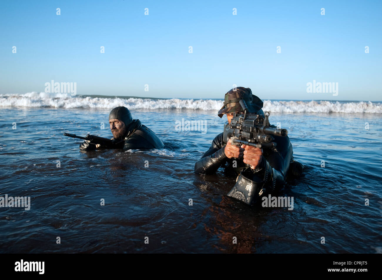 US Navy SEALs during water training at sunrise October 21, 2009 in Coronado, CA. Stock Photo