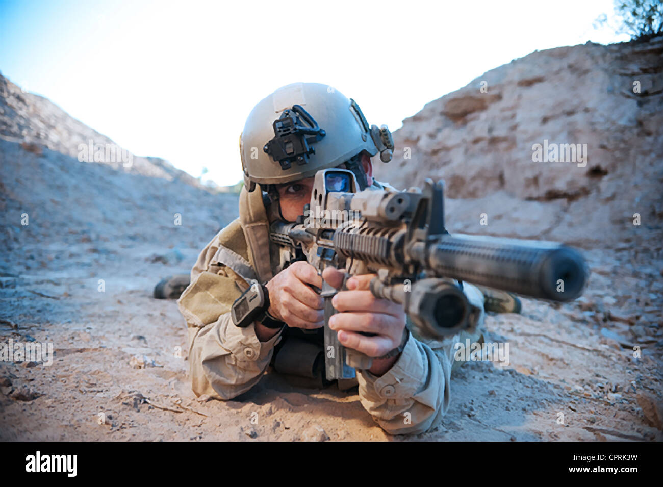 US Navy SEALs during desert combat training Stock Photo