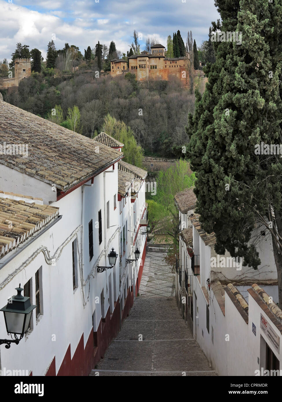 Street scene of historical Albayzin district overlooking Alhambra Palace Granada Spain Stock Photo