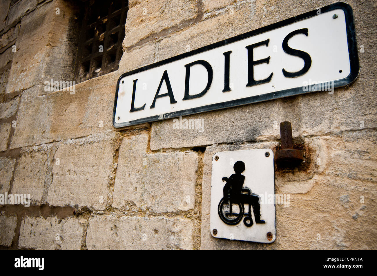 Ladies and Disabled toilet sign of public toilet, UK Stock Photo