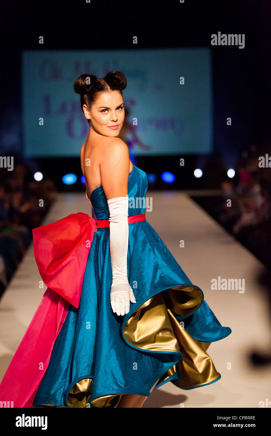 Fashion model on runway as part of The Frock Show, Brighton Fashion Week.  Designer: Oh My Honey!. 30 May 2012. Stock Photo