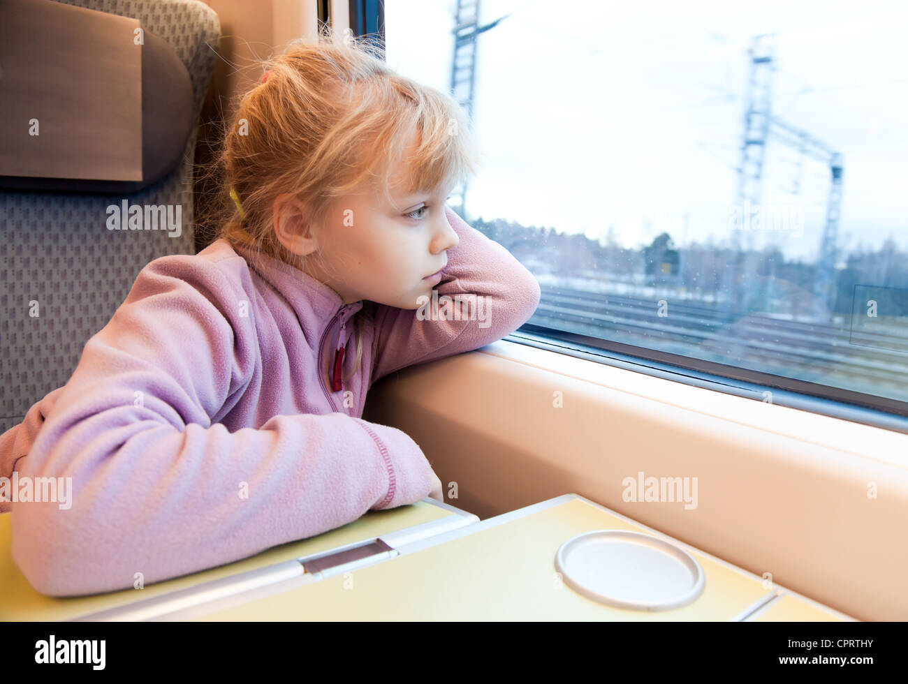 My Little Passenger Scan Little girl as a passenger of high speed train are looking in the