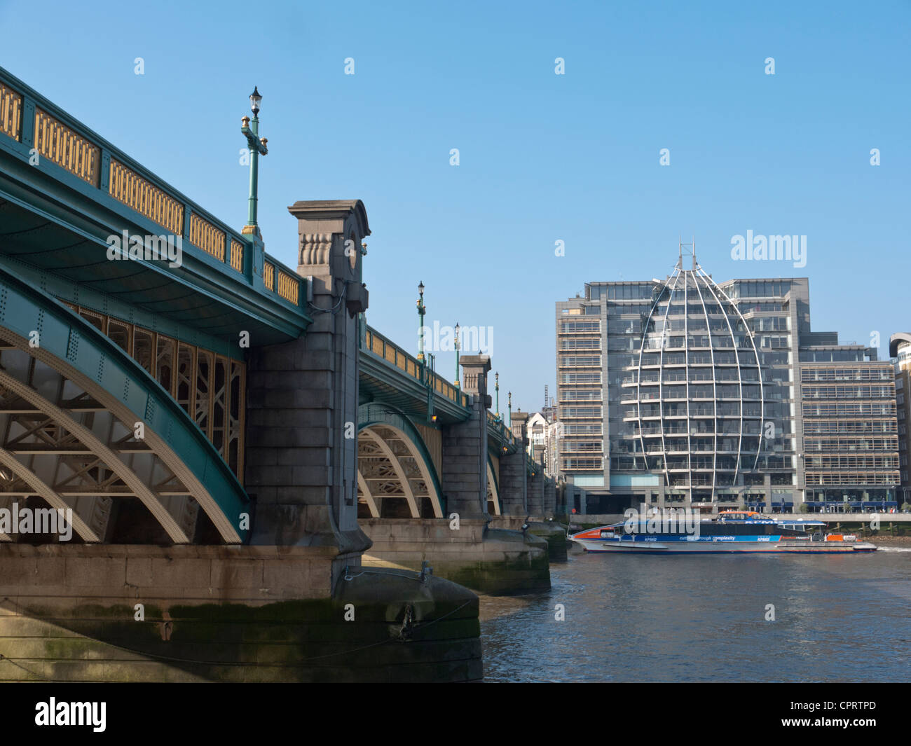 View across the River Thames and Southwark Bridge towards the south bank. Stock Photo