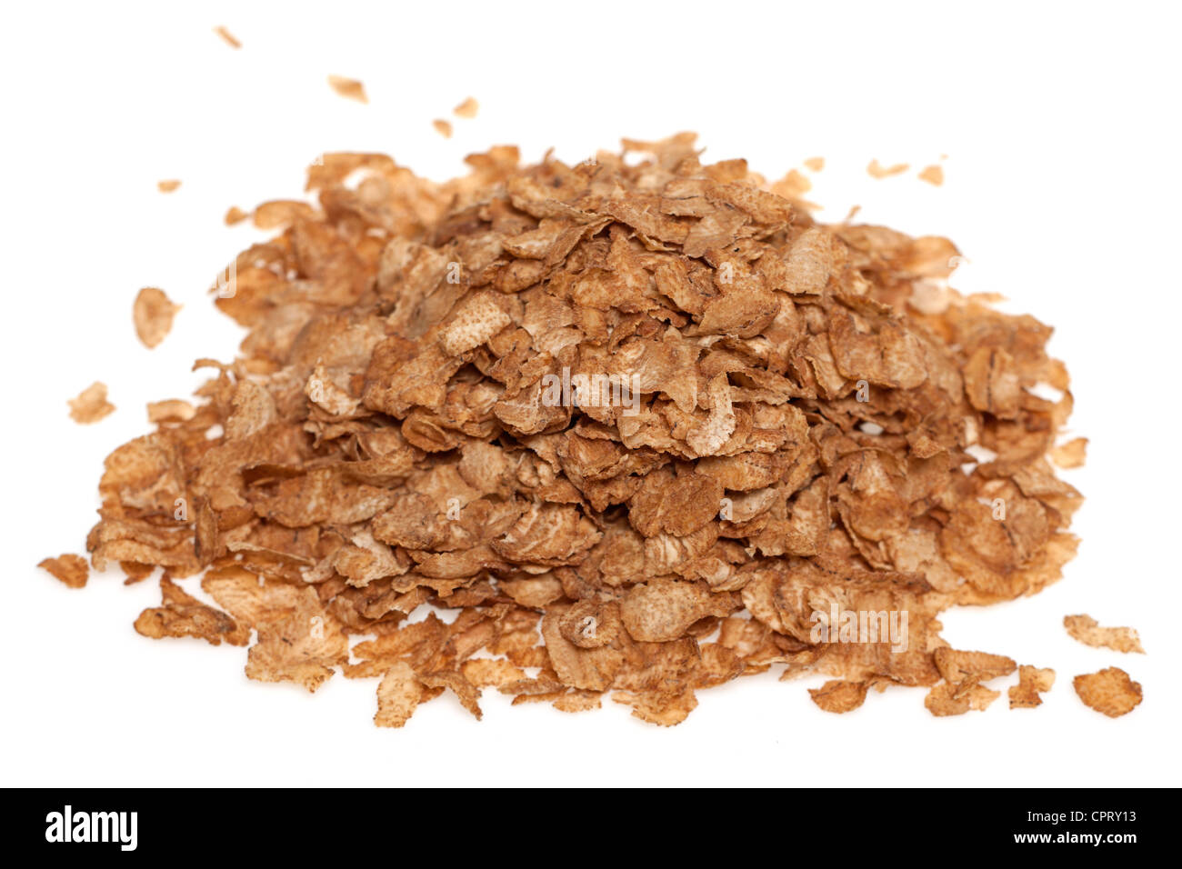 Pile of wholegrain toasted wholewheat breakfast flakes cereal Stock Photo