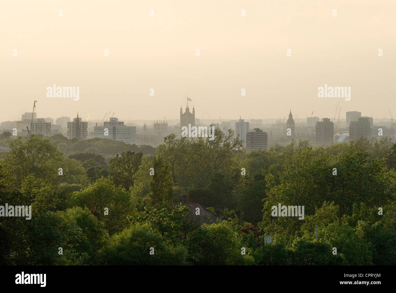 London Skyline, looking north from South London towards and in the distance Big Ben, the Houses of Parliament,  Westminster Abbey Green London a dusk. 2012 2010s UK. HOMER SYKES Stock Photo