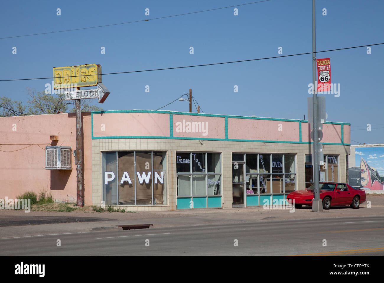 Store fronts of former pawn and gun shops on old Route 66 in Tucumcari, New Mexico. Stock Photo