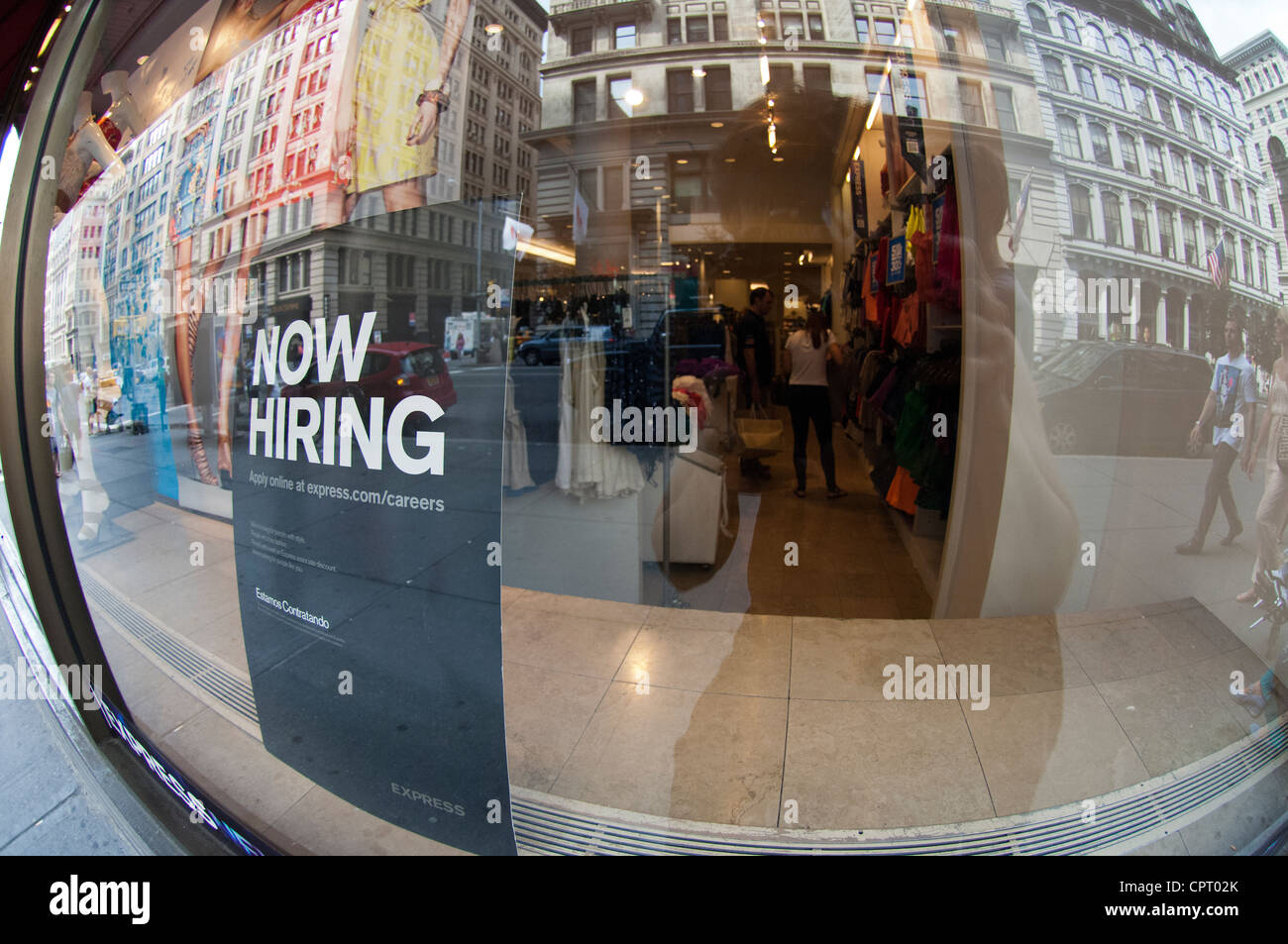 A sign outside an Express clothing store in New York advertises for workers Stock Photo
