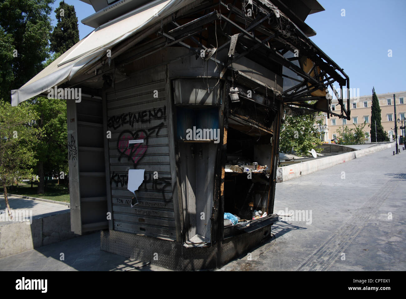 A kiosk damaged in the Greek protests in Syntagma Square. Stock Photo