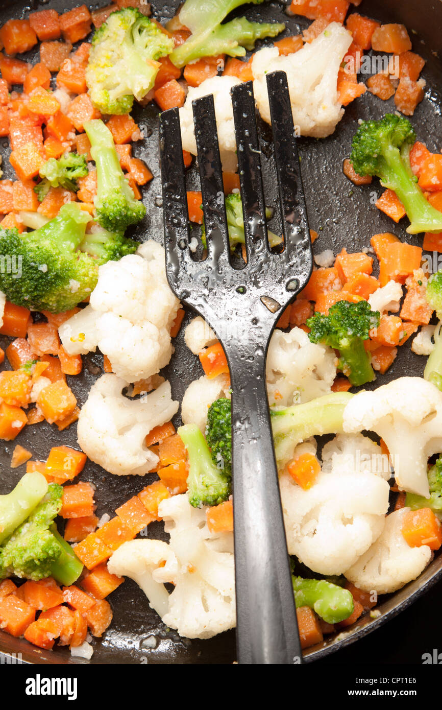 Vegetarian stirfry on a skillet Stock Photo