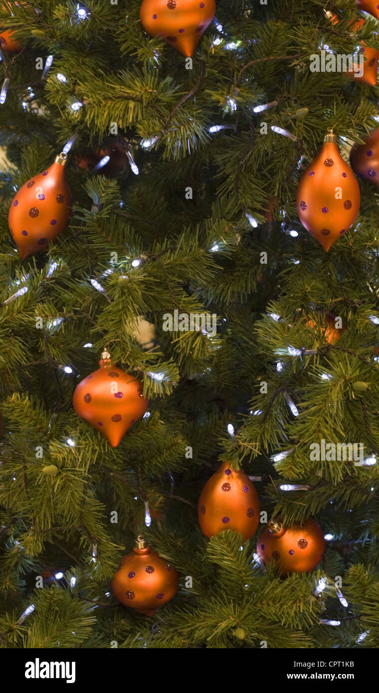 Closeup image of a Christmas tree decorated with orange balls Stock ...