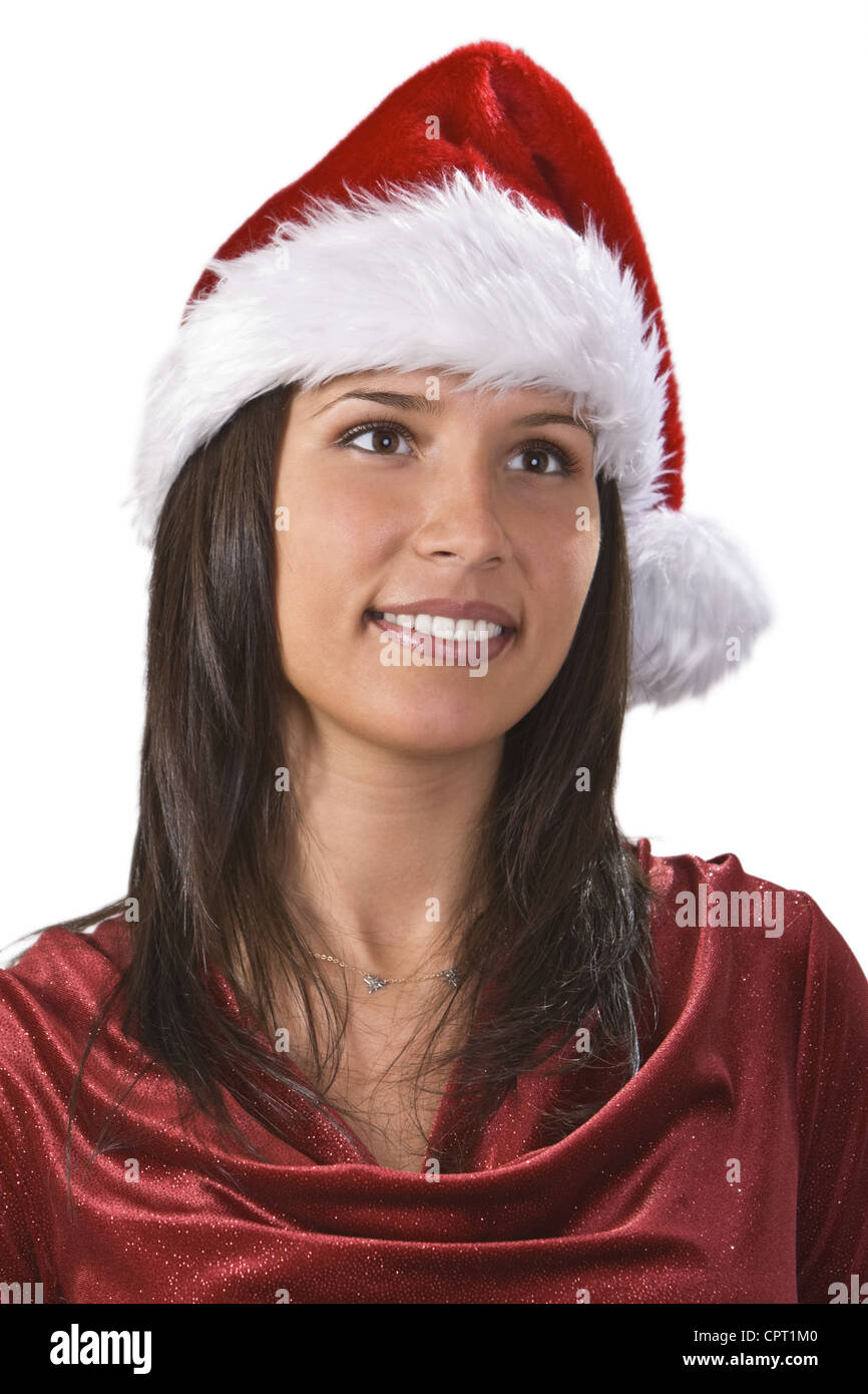 Portrait of a beautiful brunette wearing Santa's hat Stock Photo - Alamy