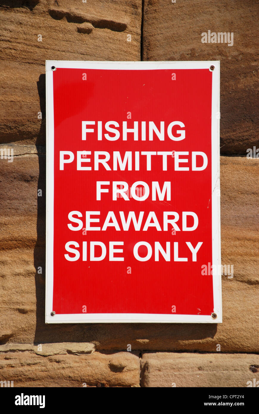 Fishing safety sign Whitby Pier North Yorkshire United Kingdom Stock Photo