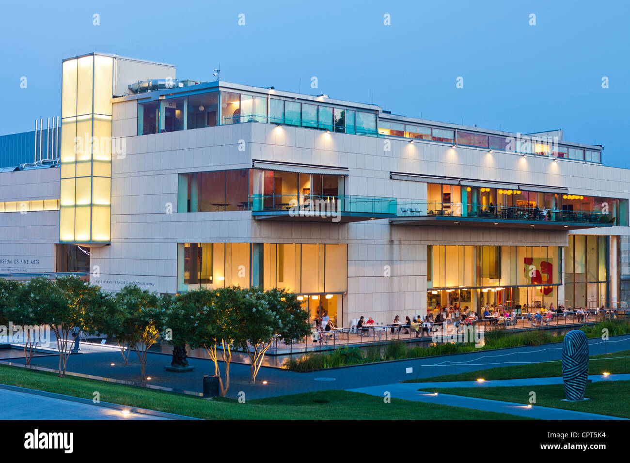 The Virginia Museum Of Fine Arts At Night With People Eating And Drinking On The Patio. Stock Photo