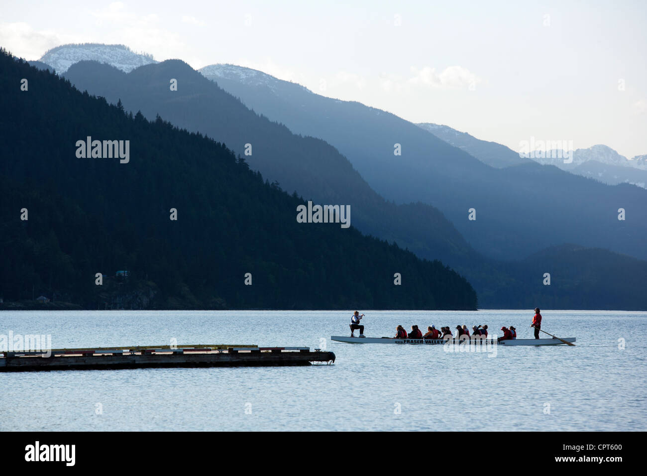 Fraser Valley Dragon Boat Club rowing on Harrison Lake - Harrison Hot Springs, British Columbia, Canada Stock Photo