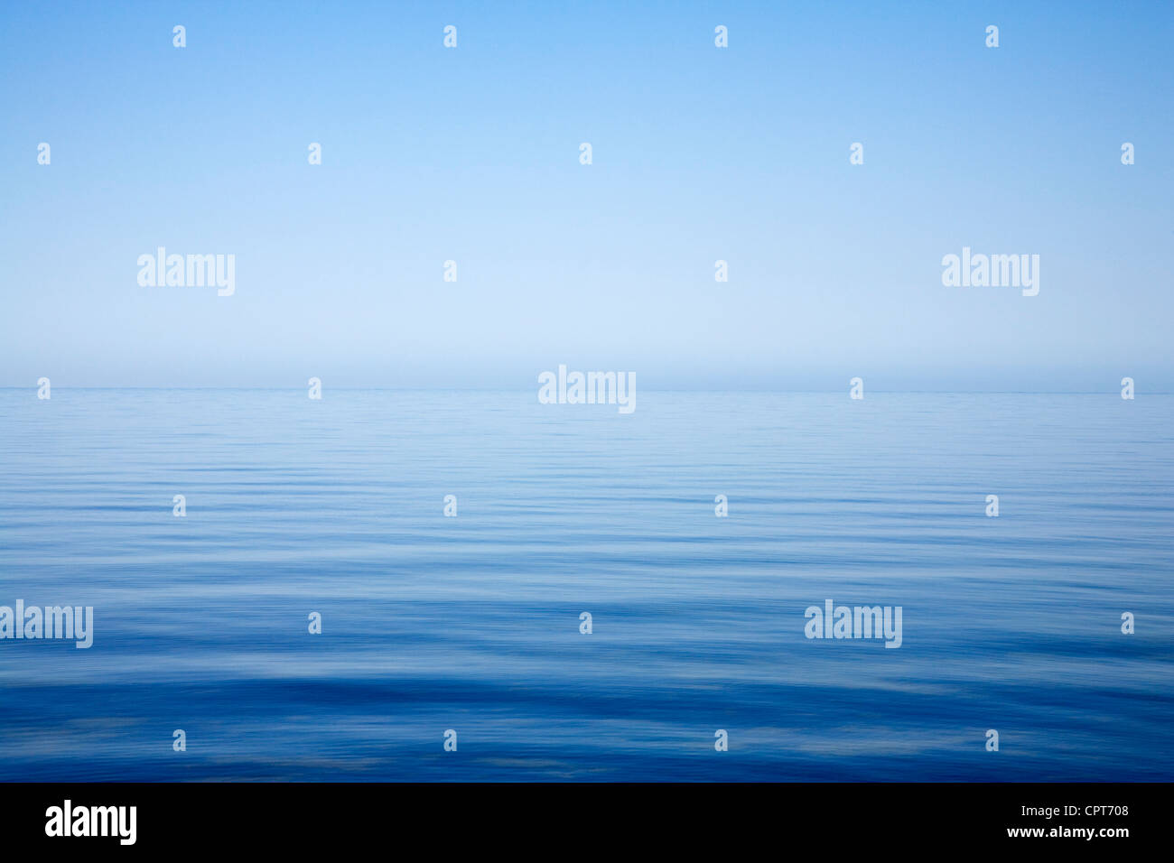 Blue seascape clear sky calm hi-res stock photography and images - Alamy