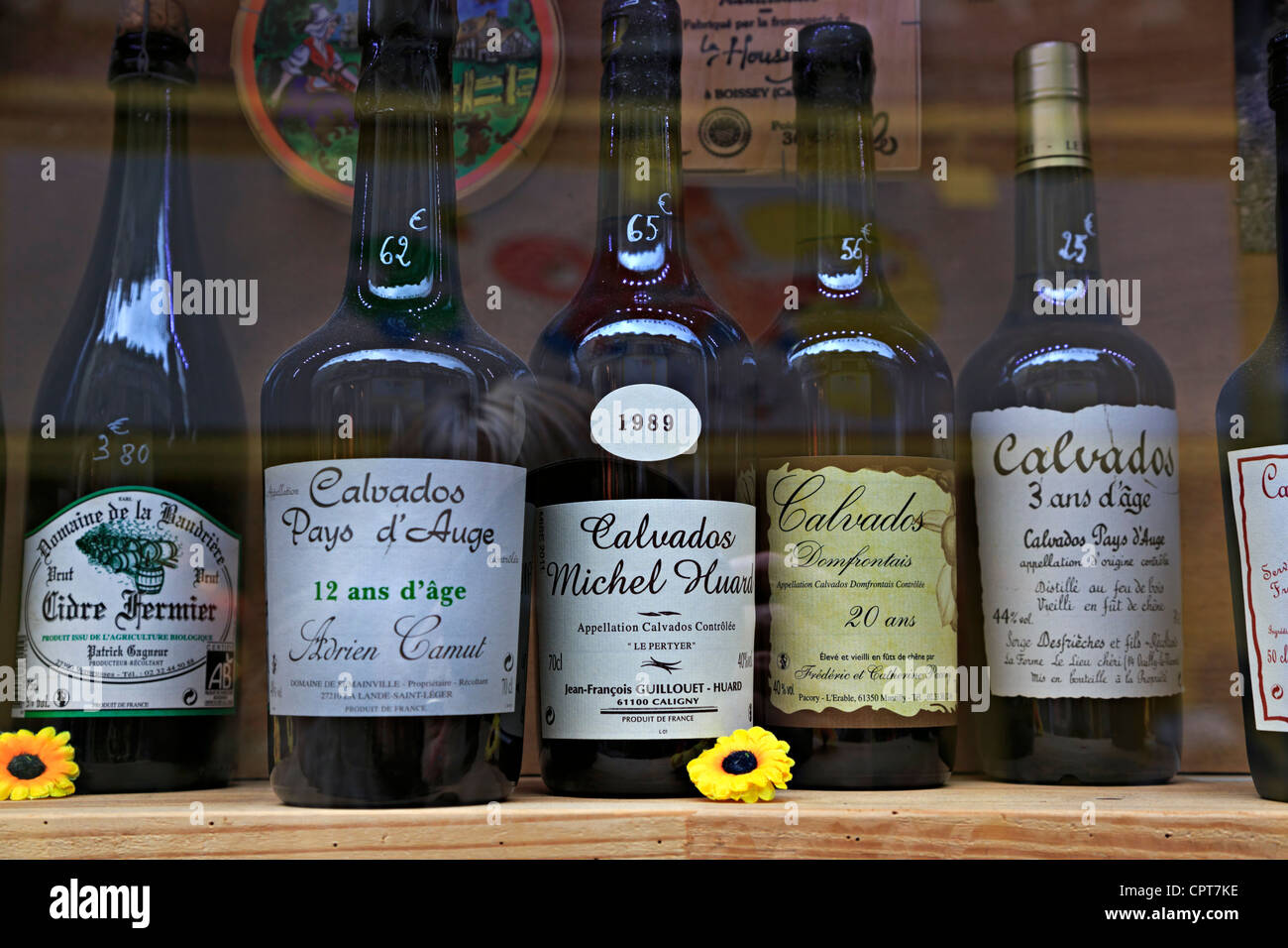 Window display of Calvados. Apple brandy is made in Lower Normandy from ...