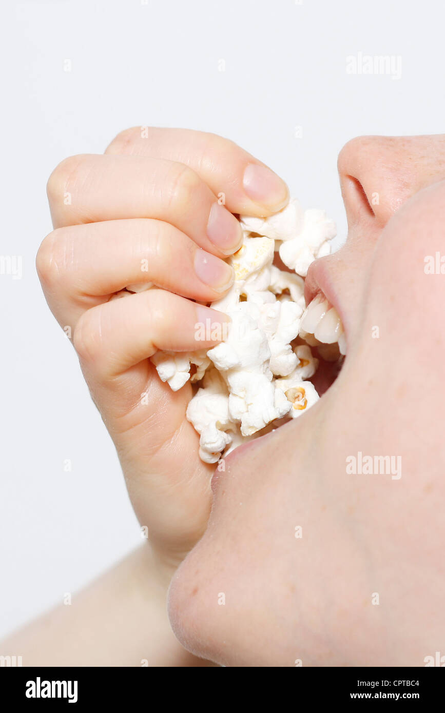 eating popcorn Stock Photo